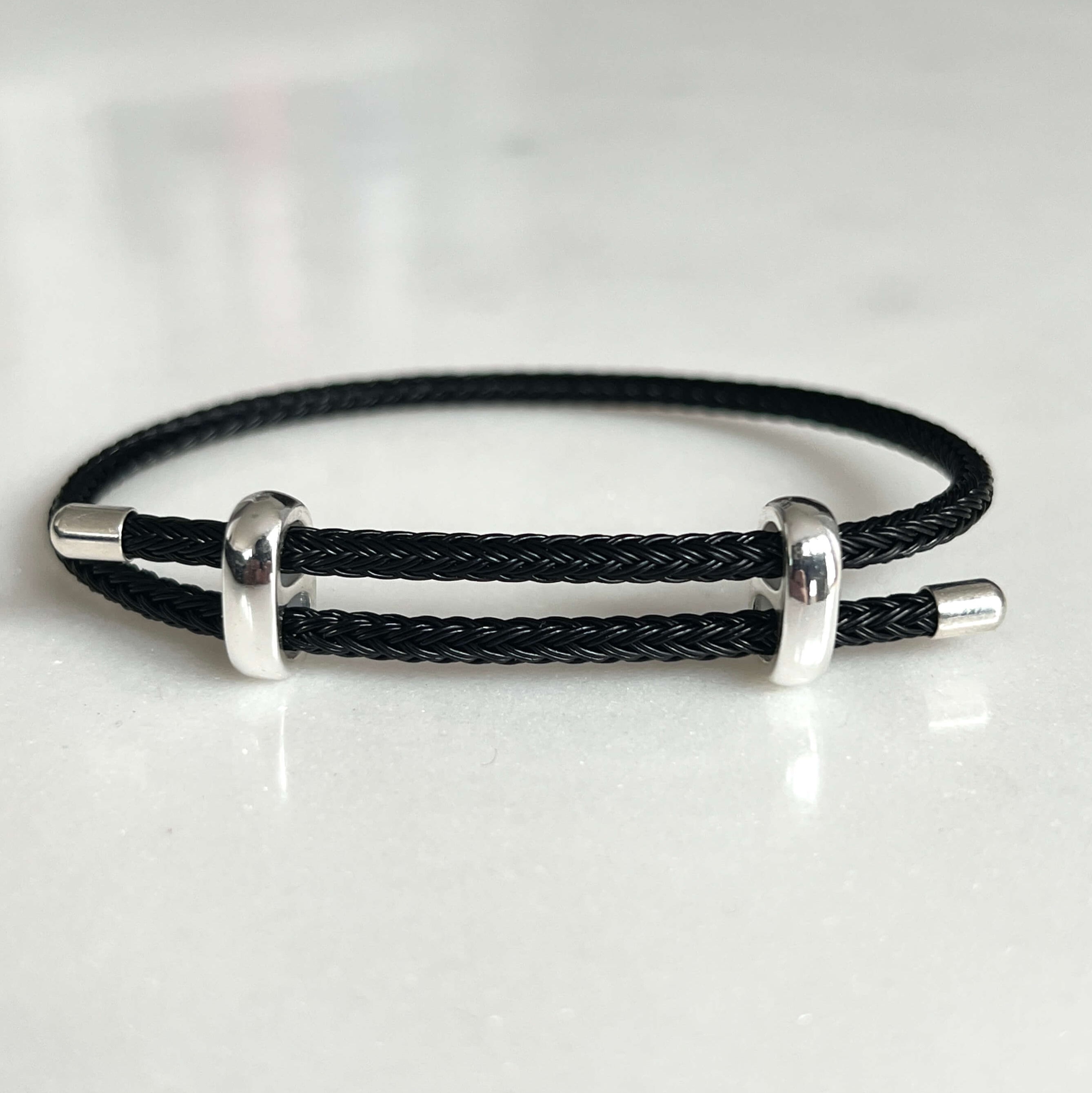 Bracelet en câble d'acier tressé, argent et noir
